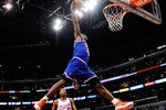 LOS ANGELES, CA - JANUARY 16:  LeBron James #23 of the Cleveland Caveliers dunks the ball against the Los Angeles Clippers during the first quarter of the NBA basketball game at Staples Center on January 16, 2010 in Los Angeles, California. NOTE TO USER: User expressly acknowledges and agrees that, by downloading and or using this photograph, User is consenting to the terms and conditions of the Getty Images License Agreement.  (Photo by Kevork Djansezian/Getty Images)