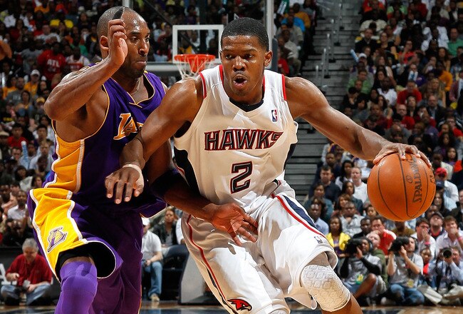 ATLANTA - MARCH 31:  Joe Johnson #2 of the Atlanta Hawks drives against Kobe Bryant #24 of the Los Angeles Lakers at Philips Arena on March 31, 2010 in Atlanta, Georgia.  NOTE TO USER: User expressly acknowledges and agrees that, by downloading and/or using this Photograph, User is consenting to the terms and conditions of the Getty Images License Agreement.  (Photo by Kevin C. Cox/Getty Images)