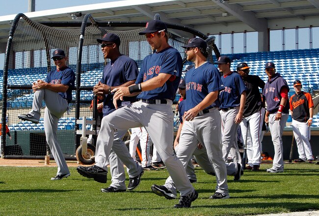 SARASOTA, FL - MARCH 27:  Outfielder Josh Reddick #68 of the Boston Red Sox stretches with his team before batting practice as they prepare to play the Baltimore Orioles during a Grapefruit League Spring Training Game at Ed Smith Stadium on March 27, 2010 in Sarasota, Florida.  (Photo by J. Meric/Getty Images)