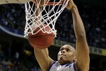 NASHVILLE, TN - MARCH 12:  Daniel Orton #33 of the Kentucky Wildcats dunks against the Alabama Crimson Tide during the quarterfinals of the SEC Men's Basketball Tournament at the Bridgestone Arena on March 12, 2010 in Nashville, Tennessee.  (Photo by Andy Lyons/Getty Images)