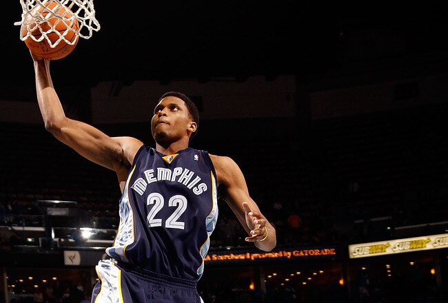 NEW ORLEANS - MARCH 03:  Rudy Gay #22 of the Memphis Grizzlies dunks the ball over David West #30 of the New Orleans Hornets to end the game at the New Orleans Arena on March 3, 2010 in New Orleans, Louisiana.  The Grizzlies defeated the Hornets 104-100.  NOTE TO USER: User expressly acknowledges and agrees that, by downloading and/or using this Photograph, User is consenting to the terms and conditions of the Getty Images License Agreement.  (Photo by Chris Graythen/Getty Images)
