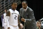ANAHEIM, CA - DECEMBER 12:  Head coach Lorenzo Romar of the Washington Huskies gives instructions to Isaiah Thomas #2 during the game with the Georgetown Hoyas in the John Wooden Classic on December 12, 2009 at the Honda Center in Anaheim, California. Georgetown won 74-66.  (Photo by Stephen Dunn/Getty Images)