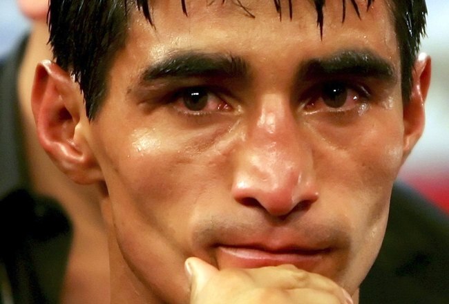 LAS VEGAS - NOVEMBER 18:  Erik Morales of Mexico waits to be interviewed after his super featherweight bout against Manny Pacquiao of the Philippines at the Thomas & Mack Center on November 18, 2006 in Las Vegas, Nevada. Pacquaio knocked out Morales in the third round for the victory.  (Photo by Jed Jacobsohn/Getty Images)