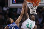 BOSTON - MARCH 31:  Kendrick Perkins #43 of the Boston Celtics tries to block a shot by Russell Westbrook #0 of the Oklahoma City Thunder on March 31, 2010 at the TD Garden in Boston, Massachusetts.  NOTE TO USER: User expressly acknowledges and agrees that, by downloading and or using this photograph, User is consenting to the terms and conditions of the Getty Images License Agreement.  (Photo by Elsa/Getty Images)