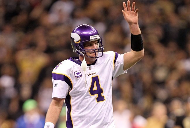 NEW ORLEANS - JANUARY 24:  Quarterback Brett Favre #4 of the Minnesota Vikings waves on the field against the New Orleans Saints during the NFC Championship Game at the Louisiana Superdome on January 24, 2010 in New Orleans, Louisiana. The Saints won 31-28 in overtime. (Photo by Ronald Martinez/Getty Images)
