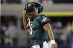 ARLINGTON, TX - JANUARY 9:  Quarterback Donovan McNabb #5 of the Philadelphia Eagles walks off the field after not converting on fourth down in the second half during the 2010 NFC wild-card playoff game against the Dallas Cowboys at Cowboys Stadium on January 9, 2010 in Arlington, Texas. (Photo by Jamie Squire/Getty Images)
