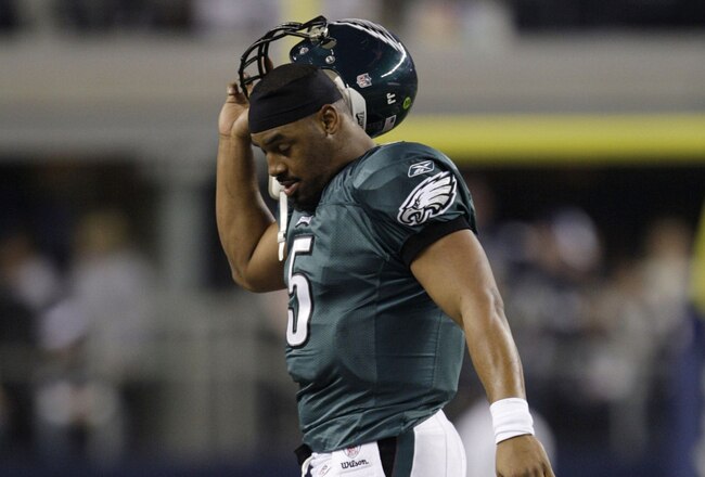 ARLINGTON, TX - JANUARY 9:  Quarterback Donovan McNabb #5 of the Philadelphia Eagles walks off the field after not converting on fourth down in the second half during the 2010 NFC wild-card playoff game against the Dallas Cowboys at Cowboys Stadium on January 9, 2010 in Arlington, Texas. (Photo by Jamie Squire/Getty Images)