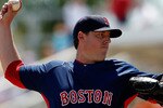 SARASOTA, FL - MARCH 27:  Pitcher John Lackey #40 of the Boston Red Sox pitches against the Baltimore Orioles during a Grapefruit League Spring Training Game at Ed Smith Stadium on March 27, 2010 in Sarasota, Florida.  (Photo by J. Meric/Getty Images)