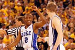 INDIANAPOLIS - APRIL 03:  Nolan Smith #2 of the Duke Blue Devils reacts with teammate Kyle Singler #12 before the Blue Devils defeated the West Virginia Mountaineers 78-57 during the National Semifinal game of the 2010 NCAA Division I Men's Basketball Championship at Lucas Oil Stadium on April 3, 2010 in Indianapolis, Indiana.  (Photo by Kevin C. Cox/Getty Images)
