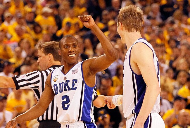 INDIANAPOLIS - APRIL 03:  Nolan Smith #2 of the Duke Blue Devils reacts with teammate Kyle Singler #12 before the Blue Devils defeated the West Virginia Mountaineers 78-57 during the National Semifinal game of the 2010 NCAA Division I Men's Basketball Championship at Lucas Oil Stadium on April 3, 2010 in Indianapolis, Indiana.  (Photo by Kevin C. Cox/Getty Images)