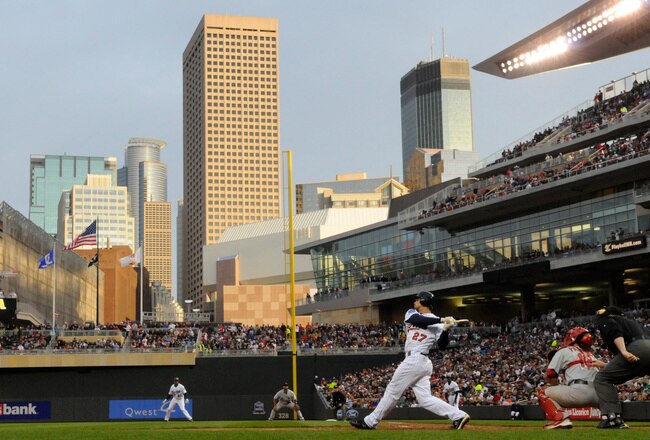 MINNESOTA, MN - APRIL 2: J.J. Hardy #27 of Minnesota Twins bats with Fernando Salas #72 pitches in the seventh inning during an exhibition game at Target Field on April 2, 2010 in Minneapolis, Minnesota. Cardinals defeated the Twins 8-4. (Photo by Hannah Foslien /Getty Images)