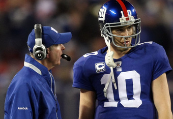 EAST RUTHERFORD, NJ - NOVEMBER 08:  Head coach Tom Coughlin of the New York Giants talks with Eli Manning #10 in NFL action against the San Diego Chargers at Giants Stadium on November 8, 2009 in East Rutherford, New Jersey.  (Photo by Nick Laham/Getty Images)