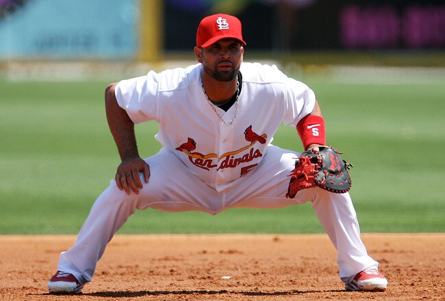 JUPITER, FL - MARCH 31:  Albert Pujols #5 of the St Louis Cardinals plays defense against the Washington Nationals at Roger Dean Stadium on March 31, 2010 in Jupiter, Florida.  (Photo by Doug Benc/Getty Images)