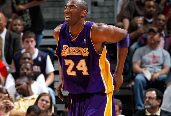 ATLANTA - MARCH 31:  Kobe Bryant #24 of the Los Angeles Lakers limps on his left foot after attacking the basket against the Atlanta Hawks at Philips Arena on March 31, 2010 in Atlanta, Georgia.  NOTE TO USER: User expressly acknowledges and agrees that, by downloading and/or using this Photograph, User is consenting to the terms and conditions of the Getty Images License Agreement.  (Photo by Kevin C. Cox/Getty Images)