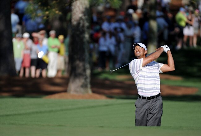 AUGUSTA, GA - APRIL 05:  Tiger Woods hits a shot during a practice round prior to the 2010 Masters Tournament at Augusta National Golf Club on April 5, 2010 in Augusta, Georgia.  (Photo by Harry How/Getty Images)