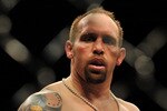 NEWARK, NJ - MARCH 27:  UFC fighter Shane Carwin celebrates defeating Frank Mir (not pictured) during their 'Interim' Heavyweight title bout at UFC 111 at the Prudential Center on March 27, 2010 in Newark, New Jersey. Carwin won by Technical Knock Out (Strikes) at 3:48 in the 1st round.  (Photo by Jon Kopaloff/Getty Images)