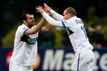MOSCOW, RUSSIA - APRIL 06: Wesley Sneijder (R) of FC Internazionale Milano celebrates after scoring a goal during the UEFA Champions League Quarter Finals, Second Leg match between CSKA Moscow and FC Internazionale Milano at Luzhniki Stadium on April 06, 2010 in Moscow, Russia.  (Photo by Dmitry Korotayev/Epsilon/Getty Images)