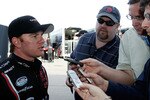 LEBANON, TN - APRIL 03:  Jason Leffler, driver of the #38 Great Clips Toyota speaks with the media during the NASCAR Nationwide Series Nashville 300 at Nashville Superspeedway on April 3, 2010 in Lebanon, Tennessee.  (Photo by Jason Smith/Getty Images for NASCAR)