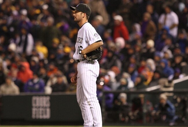 DENVER - OCTOBER 11:  Huston Street #16 of the Colorado Rockies watches the game-winning sacrifice fly which was hit by Ryan Howard #6 of the Philadelphia Phillies in the top of the ninth inning of Game Three of the NLDS during the 2009 MLB Playoffs at Coors Field on October 11, 2009 in Denver, Colorado. (Photo by Jed Jacobsohn/Getty Images)