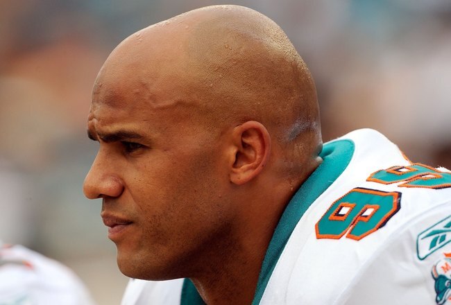JACKSONVILLE, FL - DECEMBER 13:  Jason Taylor #99 of the Miami Dolphins watches the play during the game against the Jacksonville Jaguars at Jacksonville Municipal Stadium on December 13, 2009 in Jacksonville, Florida.  (Photo by Sam Greenwood/Getty Images)