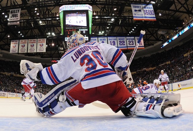 UNIONDALE, NY - MARCH 30:  Henrik Lundqvist #30 of the New York Rangers tends net against the New York Islanders at the Nassau Coliseum on March 30, 2010 in Uniondale, New York.  (Photo by Bruce Bennett/Getty Images)
