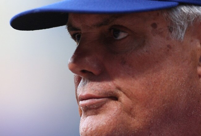 ATLANTA - APRIL 5: Manager Lou Piniella #41 of the Chicago Cubs heads back to the dugout after a pitching change against the Atlanta Braves during Opening Day at Turner Field on April 5, 2010 in Atlanta, Georgia. (Photo by Scott Cunningham/Getty Images)