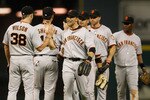 HOUSTON - APRIL 05:  Members of the San Francisco Giants celebrate their 5-2 win over the Houston Astros on Opening Day at Minute Maid Park on April 5, 2010 in Houston, Texas.  (Photo by Chris Graythen/Getty Images)