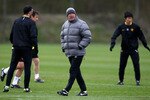 MANCHESTER, ENGLAND - APRIL 06:  Alex Ferguson the manager of Manchester United watches his players train during a training session ahead of their Champions League match against Bayern Munich at the Carrington Training Complex on April 6, 2010 in Manchester, England.  (Photo by Alex Livesey/Getty Images)