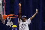 SAN ANTONIO - APRIL 06:  Center Tina Charles #31 of the Connecticut Huskies celebrates while cutting down the net after a 53-47 win against the Stanford Cardinal during the NCAA Women's Final Four Championship game at the Alamodome on April 6, 2010 in San Antonio, Texas.  (Photo by Jeff Gross/Getty Images)