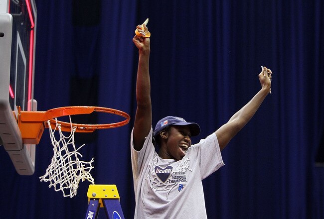 SAN ANTONIO - APRIL 06:  Center Tina Charles #31 of the Connecticut Huskies celebrates while cutting down the net after a 53-47 win against the Stanford Cardinal during the NCAA Women's Final Four Championship game at the Alamodome on April 6, 2010 in San Antonio, Texas.  (Photo by Jeff Gross/Getty Images)