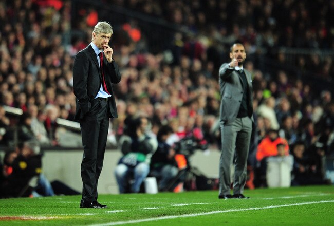 BARCELONA, SPAIN - APRIL 06:  Manager of Arsenal Arsene Wenger and manager of Barcelona Josep Guardiola react on the touchline during the UEFA Champions League quarter final second leg match between Barcelona and Arsenal at Camp Nou on April 6, 2010 in Barcelona, Spain.  (Photo by Shaun Botterill/Getty Images)