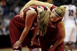 SAN ANTONIO - APRIL 06:  Kayla Pedersen (L) #14 of the Stanford Cardinal is consoled by teammate JJ Hones #10 following their teams defeat to the Connecticut Huskies during the NCAA Women's Final Four Championship game at the Alamodome on April 6, 2010 in San Antonio, Texas. Connecticut defeated Stanford 53-47.  (Photo by Jeff Gross/Getty Images)