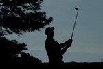 AUGUSTA, GA - APRIL 07:  Tiger Woods plays a shot during a practice round prior to the 2010 Masters Tournament at Augusta National Golf Club on April 7, 2010 in Augusta, Georgia.  (Photo by Andrew Redington/Getty Images)