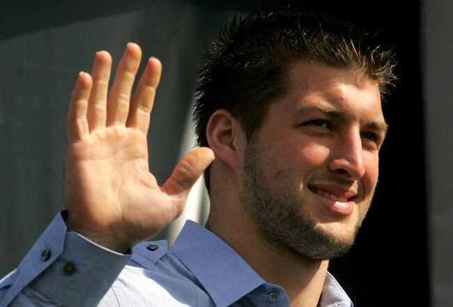 DAYTONA BEACH, FL - FEBRUARY 11:  Quaterback Tim Tebow #7 of the Florida Gators stands onstage before the first NASCAR Sprint Cup Series Gatorade Duel at Daytona International Speedway on February 11, 2010 in Daytona Beach, Florida.  (Photo by Jerry Markland/Getty Images for NASCAR)