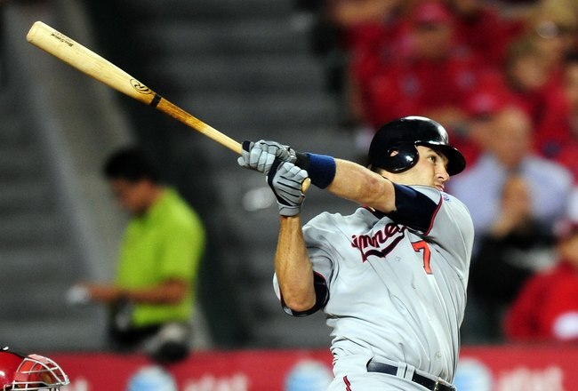 ANAHEIM, CA - APRIL 06: Joe Mauer #7 of the Minnisota Twins bats while playing against the Los Angeles Angels of Anaheim on April 6, 2010 in Anaheim, California. The Twins defeated the Angels 5-3.  (Photo by Jacob de Golish/Getty Images)