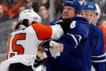 TORONTO - APRIL 6: Colton Orr #28 of the Toronto Maple Leafs fights Arron Asham #45 of the Philadelphia Flyers during an NHL game at the Air Canada Centre April 6, 2010 in Toronto, Ontario, Canada. (Photo by Abelimages/Getty Images)