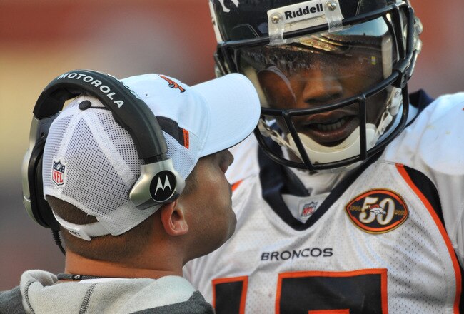 LANDOVER, MD - NOVEMBER 15:  Brandon Marshall #15 of the Denver Broncos speaks with head coach Josh McDaniels during a time out during the game against the Washington Redskins at FedExField on November 15, 2009 in Landover, Maryland. The Redskins defeated the Broncos 27-17. (Photo by Larry French/Getty Images)