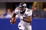 INDIANAPOLIS - DECEMBER 13:  Brandon Marshall #15 of the Denver Broncos runs with the ball during the NFL game against the Indianapolis Colts at Lucas Oil Stadium on December 13, 2009 in Indianapolis, Indiana.  The Colts won 28-16.  (Photo by Andy Lyons/Getty Images)