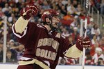 DETROIT - APRIL 10: Ben Smith #12 of the Boston College Eagles celebrates his goal in the first period against the Wisconsin Badgers on April 10, 2010 during the championship game of the 2010 NCAA Frozen Four at Ford Field in Detroit, Michigan. (Photo by Elsa/Getty Images)