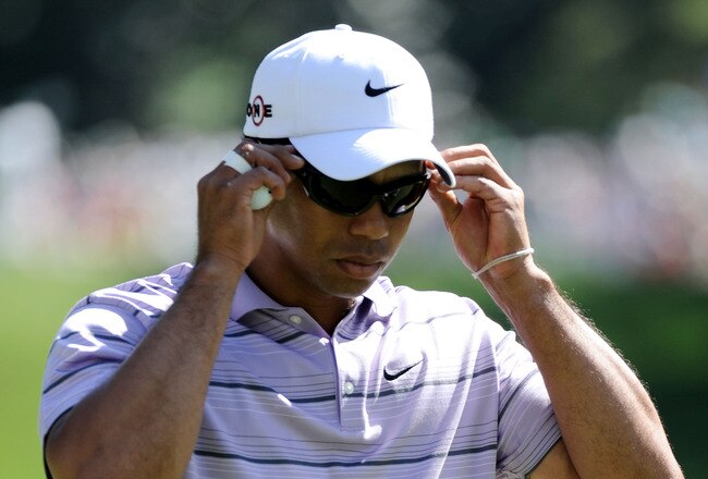 AUGUSTA, GA - APRIL 10:  Tiger Woods walks off the sixth green during the third round of the 2010 Masters Tournament at Augusta National Golf Club on April 10, 2010 in Augusta, Georgia.  (Photo by Harry How/Getty Images)