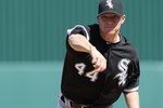 TEMPE, AZ - MARCH 12:  Starting pitcher Jake Peavy #44 of the Chicago White Sox pitches against the Los Angeles Angels of Anaheim during the MLB spring training game at Tempe Diablo Stadium on March 12, 2010 in Tempe, Arizona.  The White Sox defeated the Angels 10-7.  (Photo by Christian Petersen/Getty Images)