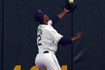 ST. PETERSBURG, FL - APRIL 06:  Outfielder B.J. Upton #2 of the Tampa Bay Rays catches a fly ball against the Baltimore Orioles during the home opener game at Tropicana Field on April 6, 2010 in St. Petersburg, Florida.  (Photo by J. Meric/Getty Images)