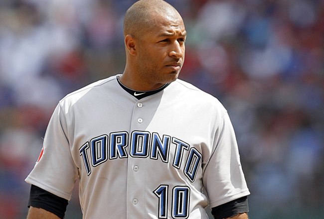 ARLINGTON, TX - APRIL 05:  Center fielder Vernon Wells #10 of the Toronto Blue Jays stands on first base against the Texas Rangers on Opening Day at Rangers Ballpark on April 5, 2010 in Arlington, Texas. (Photo by Tom Pennington/Getty Images)