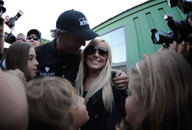 AUGUSTA, GA - APRIL 11:  Phil Mickelson celebrates with his wife Amy and children (L-R) Amanda, Evan and Sophia after his three-stroke victory after winning the 2010 Masters Tournament at Augusta National Golf Club on April 11, 2010 in Augusta, Georgia.  (Photo by Harry How/Getty Images)