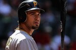 PHOENIX - APRIL 11:  Garrett Jones #46 of the Pittsburgh Pirates warms up on deck during the major league baseball game against the Arizona Diamondbacks at Chase Field on April 11, 2010 in Phoenix, Arizona.  (Photo by Christian Petersen/Getty Images)