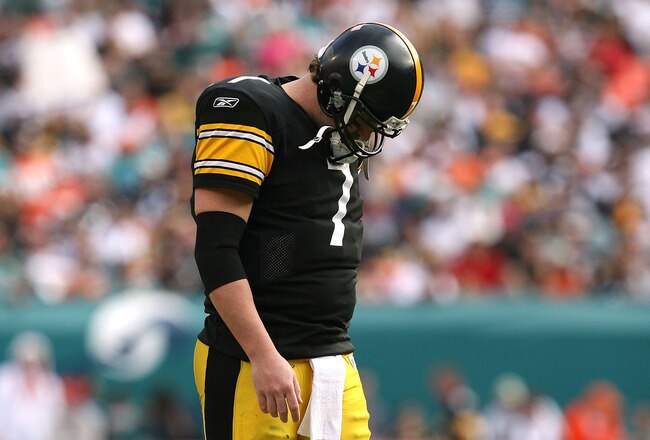 MIAMI - JANUARY 03:  Quarterback Ben Roethlisberger #7 of the Pittsburgh Steelers walks back to the huddle after injuring his shoulder in the fourth quarter against the Miami Dolphins at Land Shark Stadium on January 3, 2010 in Miami, Florida. The Steelers defeated the Dolphins 30-24.  (Photo by Doug Benc/Getty Images)