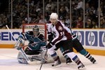 SAN JOSE, CA - MARCH 28:  Thomas Greiss #1 and Niclas Wallin #7 of the San Jose Sharks defend against TJ Galiardi #39 of the Colorado Avalanche at HP Pavilion on March 28, 2010 in San Jose, California.  (Photo by Ezra Shaw/Getty Images)