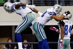 ARLINGTON, TX - OCTOBER 25:  Miles Austin (C) #19 of the Dallas Cowboys celebrates a touchdown with Martellus Bennett #80 and Patrick Crayton #84 against the Atlanta Falcons at Cowboys Stadium on October 25, 2009 in Arlington, Texas.  (Photo by Ronald Martinez/Getty Images)