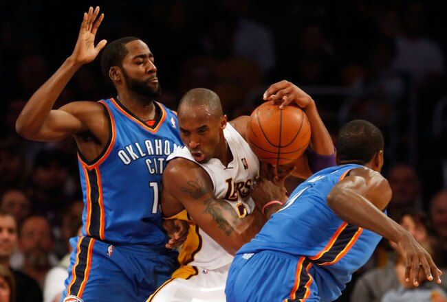 LOS ANGELES, CA - NOVEMBER 22:  Kobe Bryant #24 of the Los Angeles Lakers is defended by James Harden (L) #13 and Serge Ibaka (R) #9 of the Oklahoma City Thunder in the first half at Staples Center on November 22, 2009 in Los Angeles, California. The Lakers defeated the Thunder 101-85. NOTE TO USER: User expressly acknowledges and agrees that, by downloading and/or using this Photograph, user is consenting to the terms and conditions of the Getty Images License Agreement.  (Photo by Jeff Gross/Getty Images)