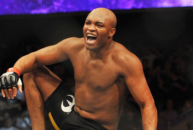 PHILADELPHIA - AUGUST 08:  Anderson Silva celebrates after defeating Forrest Griffin during their light heavyweight bout at UFC 101: Declaration at the Wachovia Center on August 8, 2009 in Philadelphia, Pennsylvania.  (Photo by Jon Kopaloff/Getty Images)